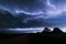 A lightningbolt creeps through the clouds over northeastern Nebraska