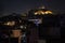 Lights of Athens city with Lycabettus mountain at sunset