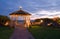 Lights on gazebo at sunset