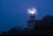 Lights in the lighthouse with fog at dawn, Igueldo, city of Donostia San Sebastian