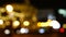 Lights of the night city background. Defocus headlights of moving cars urban traffic. Abstract bright blured colored