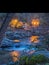 Lights reflected on stream through Lithia Park in Ashland, Oregon