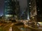 Lights streak of traffic with modern skyscraper buildings in Hong Kong city at night