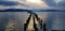 Lights of the sunset over the remains of the pier, Puerto Natales, Chile