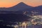 Lights of Suwa city and Mt.Fuji at dawn