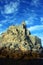 Liguria: the Saint Peter church of Portovenere on the cliff rockview and blue sky with clouds from the boat in the afternoon