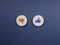 Like and dislike flat icons on white round cosmetic sponge with a green checkmark.