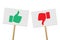 Like and dislike hand gesture signboard on white