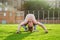 Like a spider or bug. Attractive male acrobat performing bridge sport exercise. Showing the wonders of flexibility. Training in a