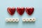 Like time words, made of wooden letters with red heart on blue background. Social media concept