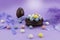 Lilac easter egg background with many speckled eggs