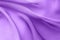 Lilac fabric with large folds, background with diagonal waves