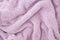Lilac fabric with large knitted fibers closeup background