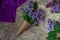 Lilac flowers bouquet. Craft paper cornet filled with spring blossom purple lilac