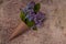 Lilac flowers bouquet. Craft paper cornet filled with spring blossom purple lilac