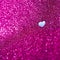 Lilac glitter abstract background with a cut out heartshaped