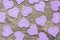 Lilac heart on a wooden surface. The wooden background with heart.