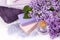 Lilac nature cosmetics, handmade preparation of essential oils, perfume, creams, soaps from fresh and lilac flowers