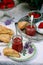 Lilac scones with strawberry curd in the summer garden