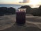 Lilac and Violet Candle Burning with Two Flames during Sunset at Beach in Kekaha on Kauai Island, Hawaii.