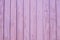 Lilac wooden background of boards, texture