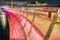 Lille Langebro is a modern cycle and pedestrian bridge in Copenhagen across the city 's canal or quayside coloured by pink