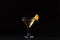 Lillet cocktail with sparkling wine and orange juice on a black background