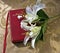 Lillies on a red Bible on gold