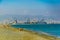 LIMASSOL, CYPRUS, AUGUST 17, 2017: Limassol viewed behind people swimming at Lady\'s mile beach on cyprus