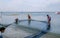 Limassol, Cyprus - September 29, 2017: men with netting catching