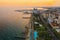 Limassol promenade at sunset, Cyprus. Aerial panoramic view of evening Limassol with Molos Park from above, drone photo