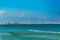 Limassol viewed behind people swimming at Lady\\\'s mile beach on cyprus