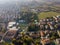 Limbiate, aerial view, the parish of St. George, the church, homes and streets downtown streets. Italy