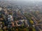 Limbiate, aerial view, the parish of St. George, the church, homes and streets downtown streets. Italy