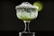 A lime-accented margarita cocktail presented in a glass rimmed with salt. AI