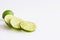 Lime. Fresh fruit isolated on white background. Slice, piece, half, quarter. Rich of nutrients, fibre, and vitamins. Picture