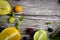 lime and fruits on wood background. top view. no photoshop used.