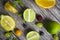 lime and fruits on wood background. top view. no photoshop used.