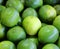 Lime is a hybrid citrus fruit, which is typically round,