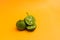 Lime or Limau (Citrus amblycarpa) isolated on orange background