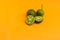 Lime or Limau (Citrus amblycarpa) isolated on orange background