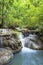 lime stone water fall in arawan water fall national park kanchanaburi thailand use for natural background