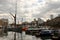 The Limehouse Basin in Limehouse, in the London Borough of Tower Hamlets with houseboats and skyscrapers in the distance