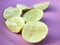 Limes with slices on dish