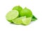 Limes with slices and leaves isolated on white background
