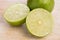 Limes on wooden cutting board