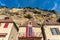 Limestone cliff and historic houses of La Roque-Gageac, Perigord