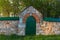 Limestone fence with iron riveted wicket