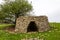 A limestone kiln on a hillside in Cumbria