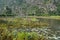 Limestone Landscape with River, Rowing Boats and Water Lilies